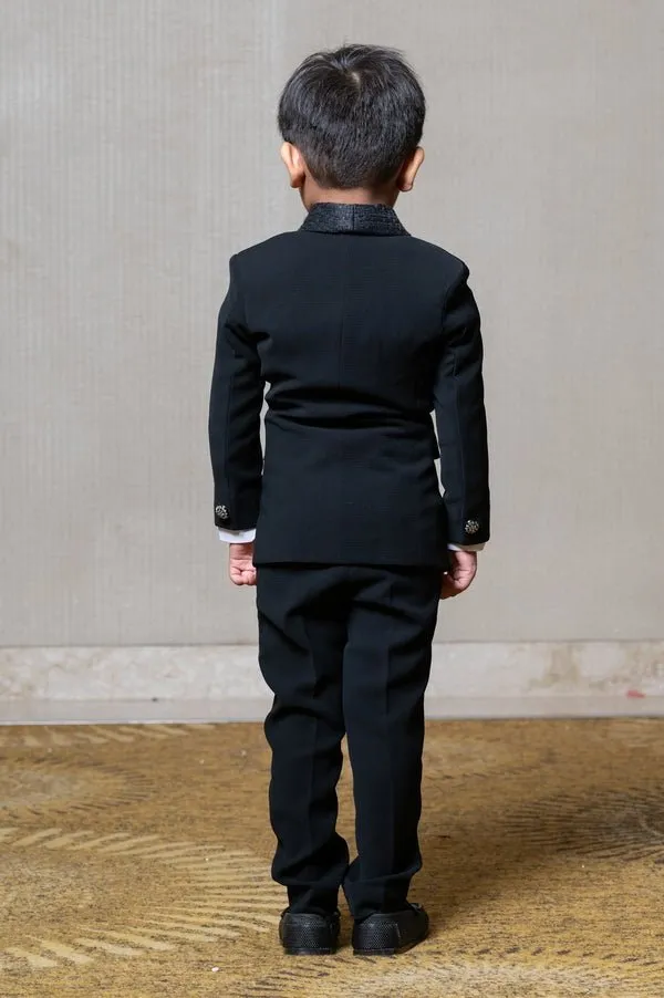 Stylish Blackslim-fit suit for boys, perfect for weddings and formal occasions.
