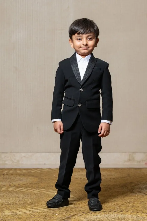 Stylish Blackslim-fit suit for boys, perfect for weddings and formal occasions.